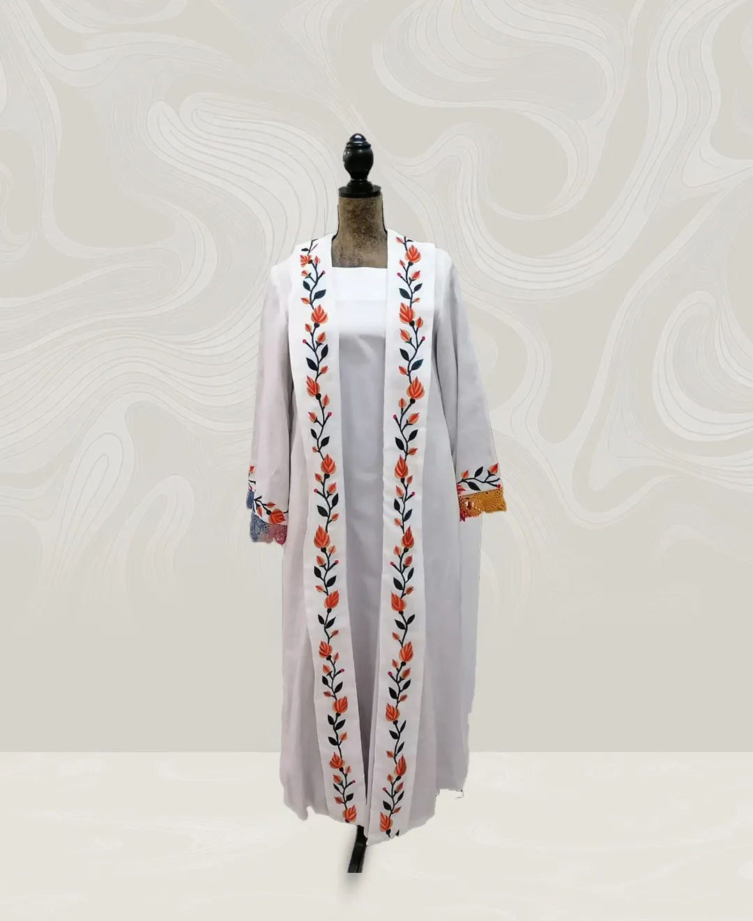 Bisht with white embroidered dress